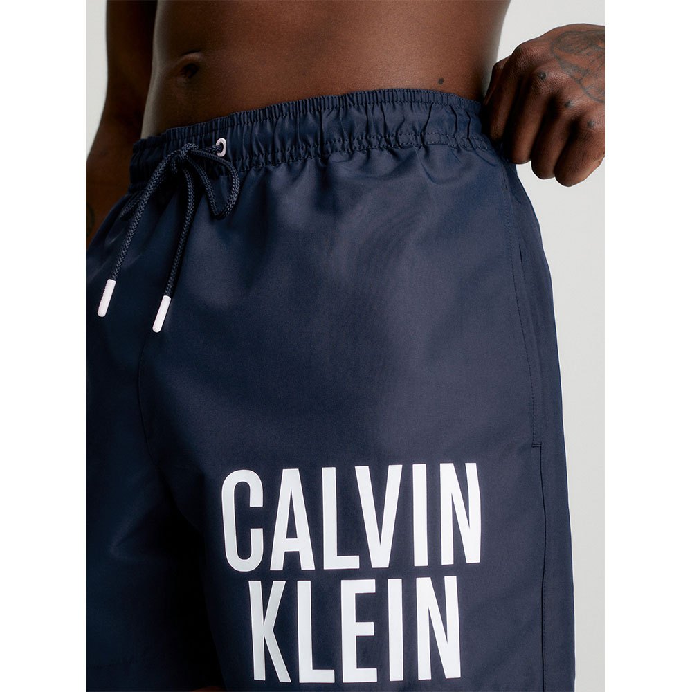 Ανδρικό Μαγιό Calvin Klein Medium Drawstring, KM0KM00794-DCA KAI ΜΕΓΑΛΑ ΜΕΓΕΘΗ, ΜΠΛΕ ΣΚΟΥΡΟ